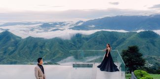 stylish man in elevated location